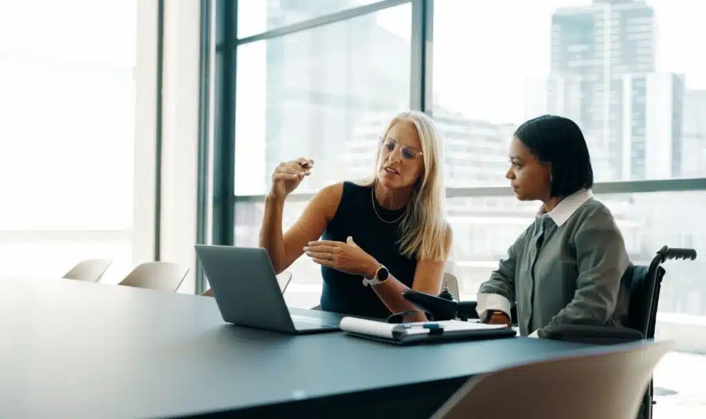 PT owner delegating tasks to her employee.