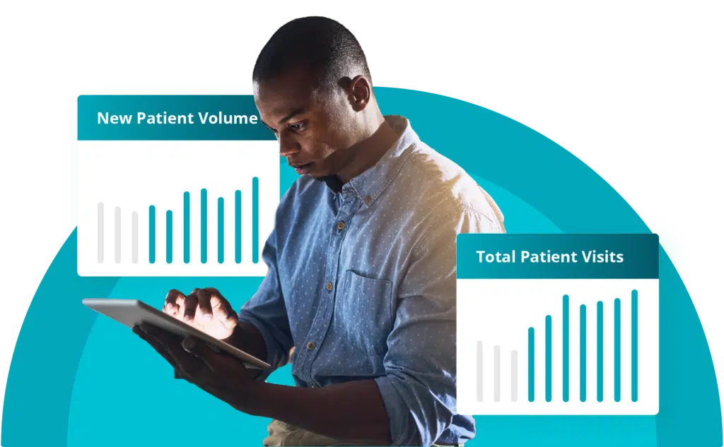Physical therapy clinic owner analyzing patient growth and performance metrics from physical therapy marketing