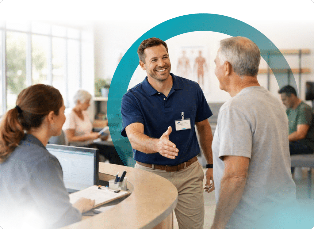 Clinic owner greeting patient at front desk, representing positive patient experience
