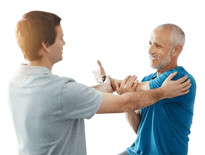 PT works on shoulder patient in the clinic